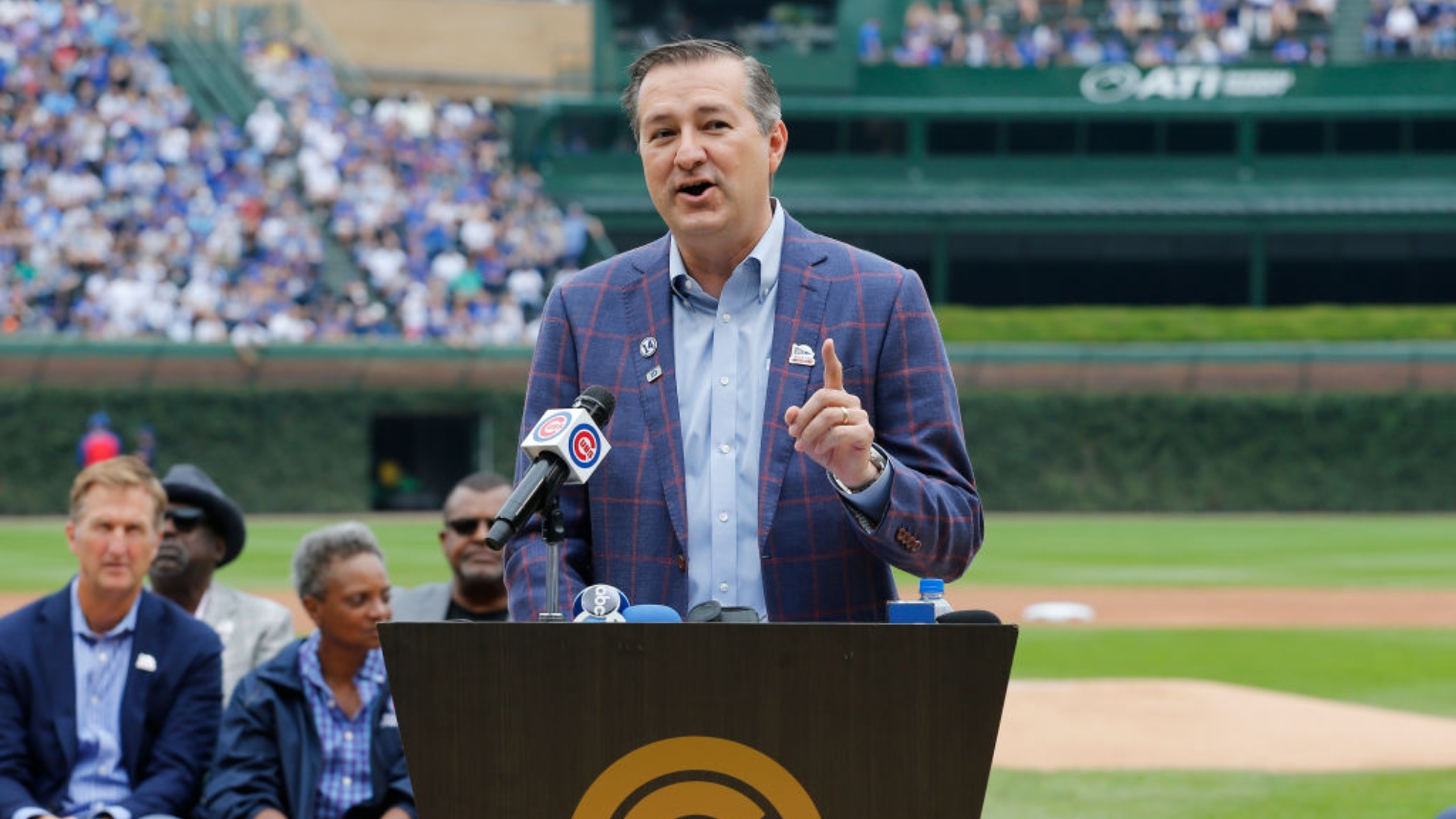 Owners of the Chicago Cubs join the race to buy the...