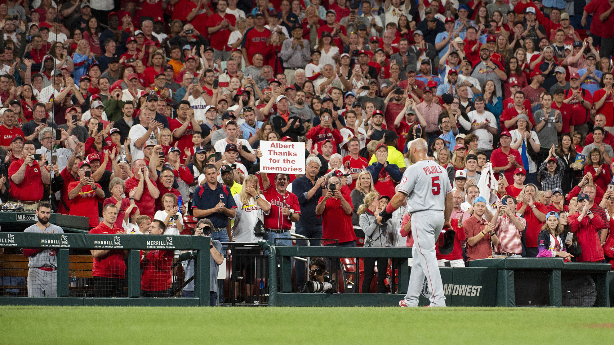 Pujols signs with the Cardinals.