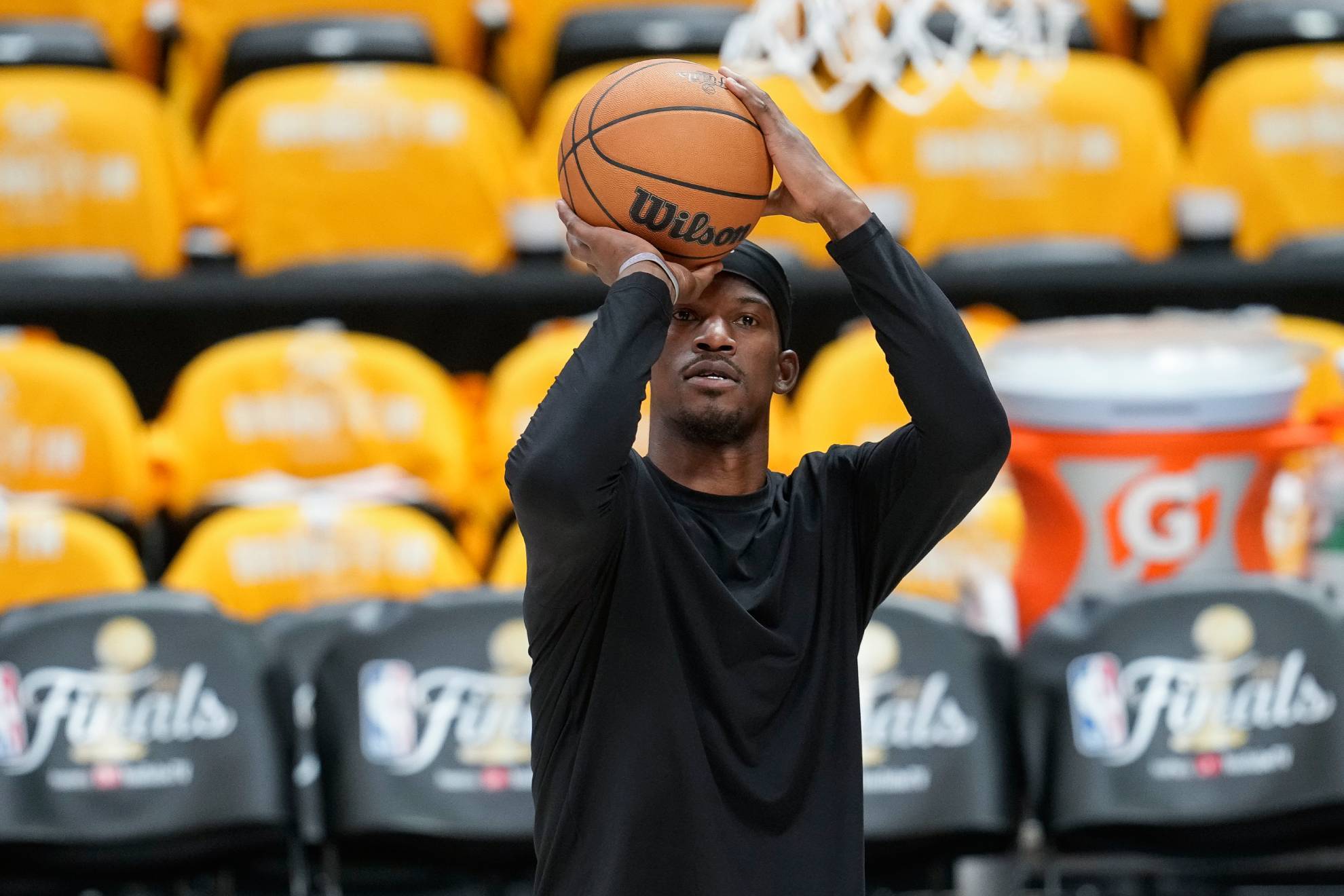 Miami Heat forward Jimmy Butler warms up before Game 1 of the basketball team's NBA Finals against the Denver Nuggets